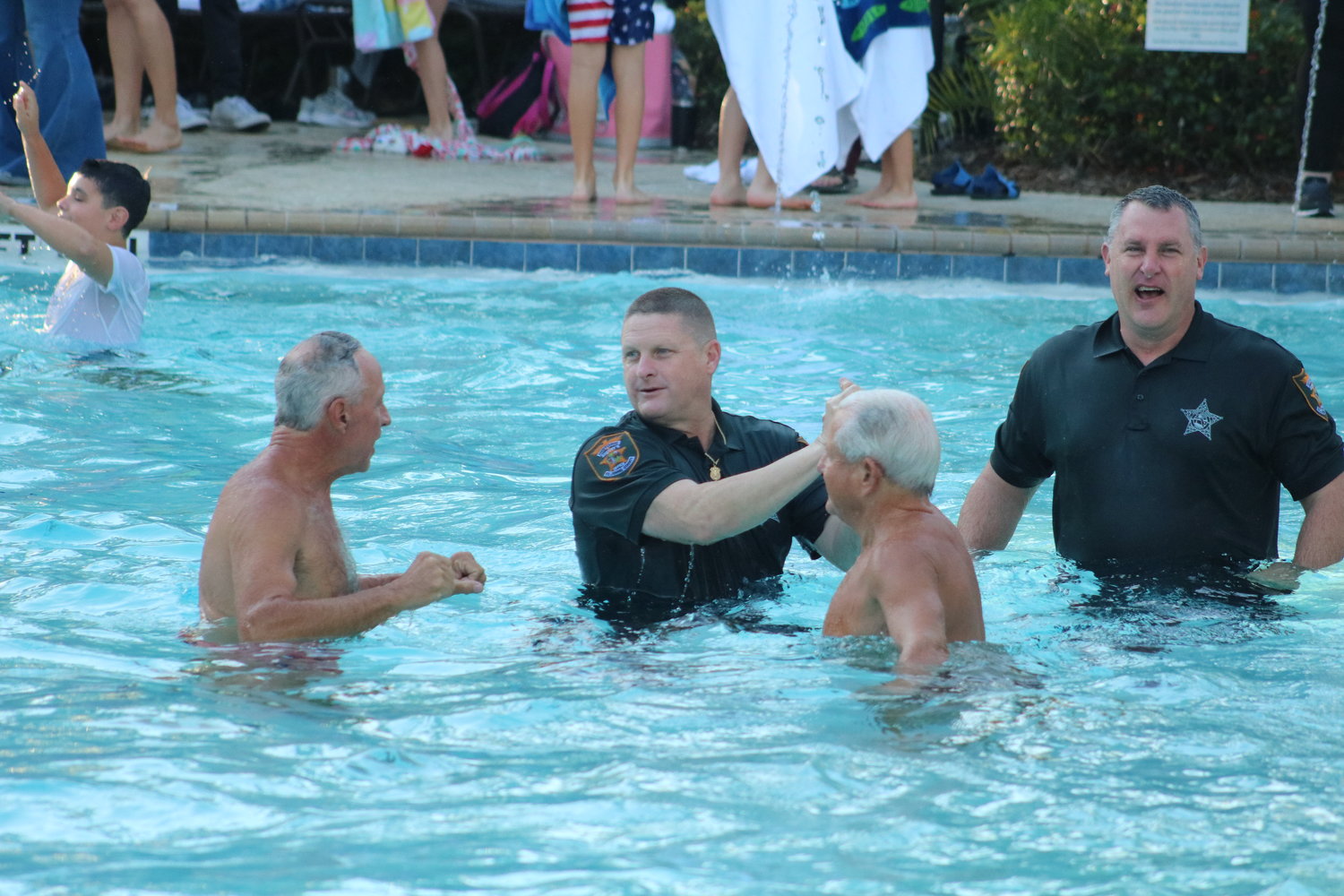 Even Sheriff Rob Hardwick took the plunge into the pool at Nocatee Splash Water Park.
